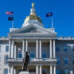 The New Hampshire State House of Representatives, a prominent building representing the state's legislative authority and history.